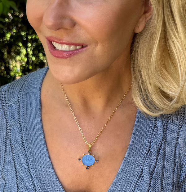 Cupid Riding Dolphin Necklace in Iolite