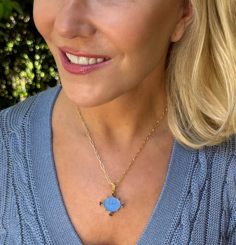Cupid Riding Dolphin Necklace in Iolite