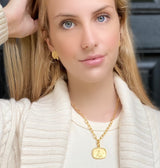 Model wearing Mithra Gold Pendant Enhancer