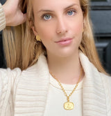 Model wearing Cherub Gold Post Earring