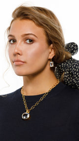 Model wearing Emerald Cut Rock Crystal Drop Earrings